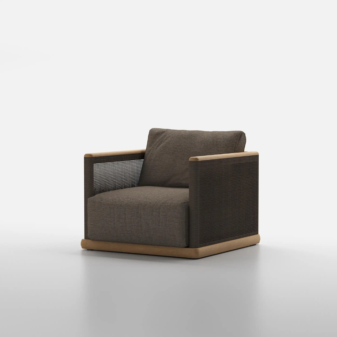 Beautiful, modern and stylish teak armchair in a studio background