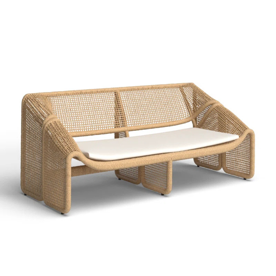 Relaxed style wicker sofas for garden lounge, double sofa, front view, in a studio bakground