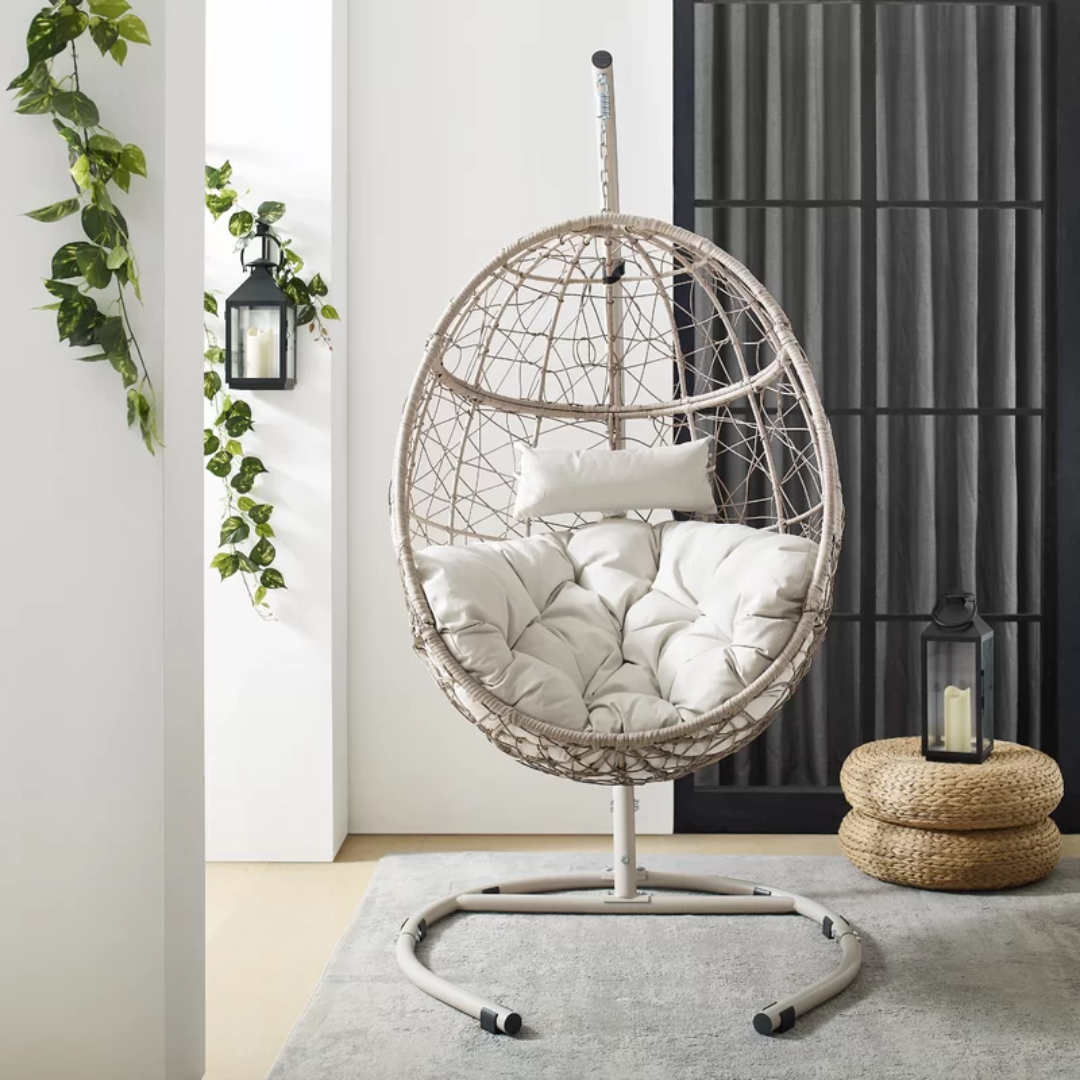 Modern Egg Hanging Chair With Stand styled in a modern living room