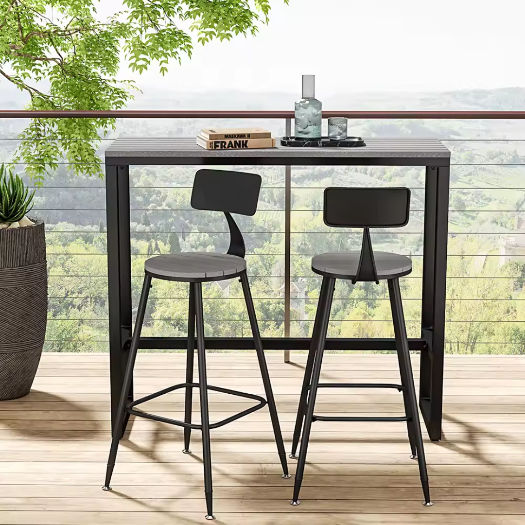 Small black outdoor bar table for garden or patio, on a balcony