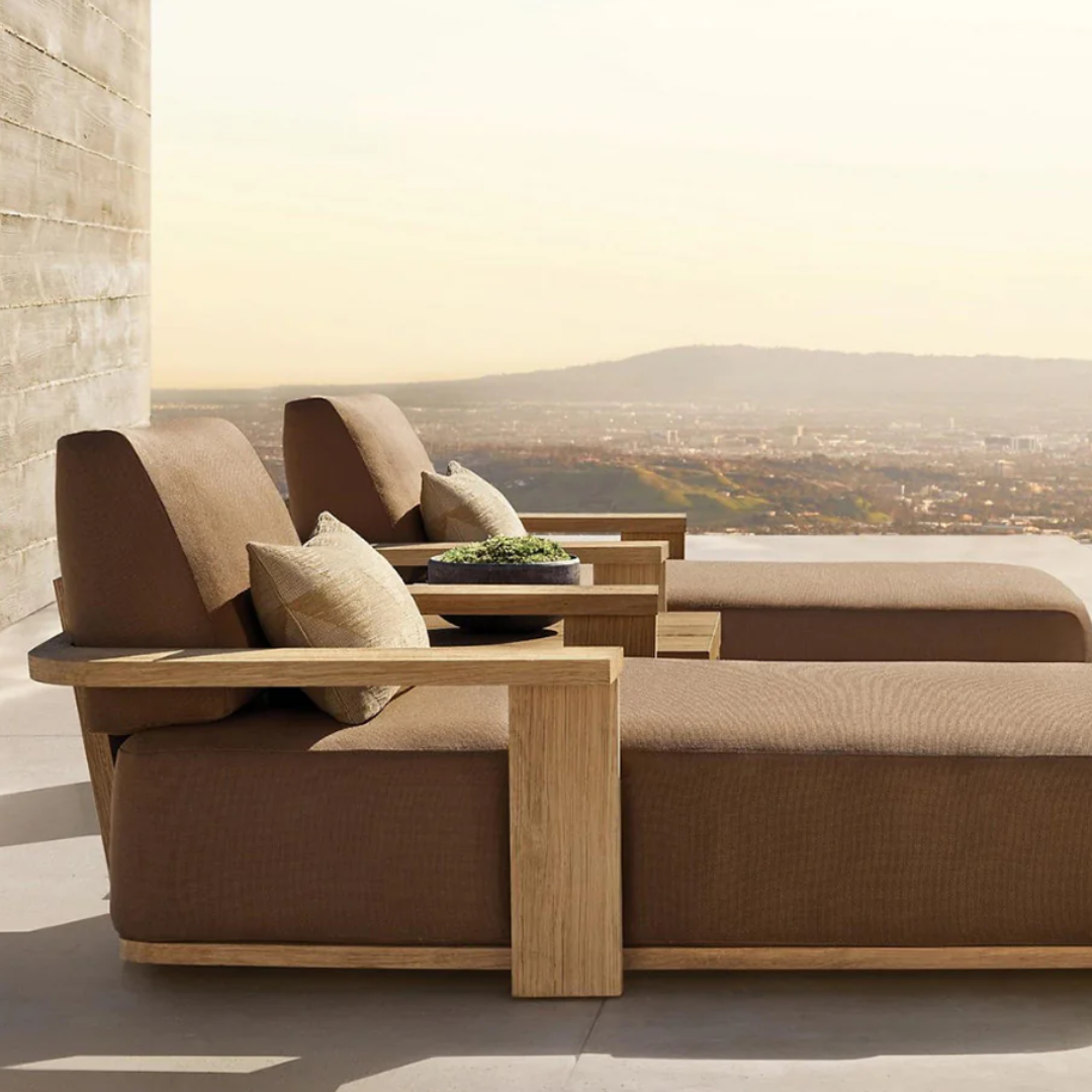 Solid Wood Brown Garden Sun Lounger styled in a luxury garden