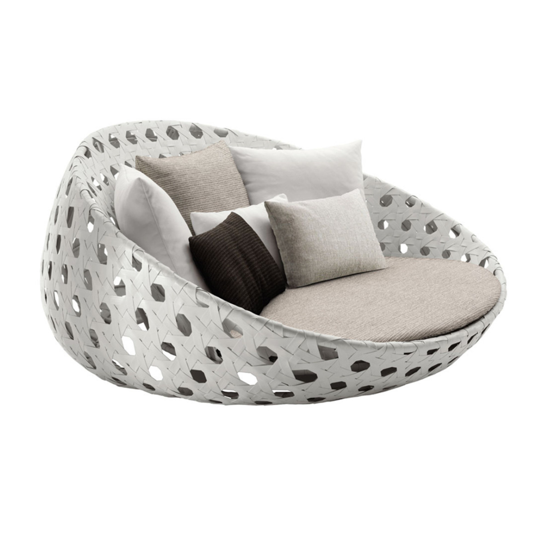 "Luxury white woven outdoor round daybed for poolside relaxation, white background