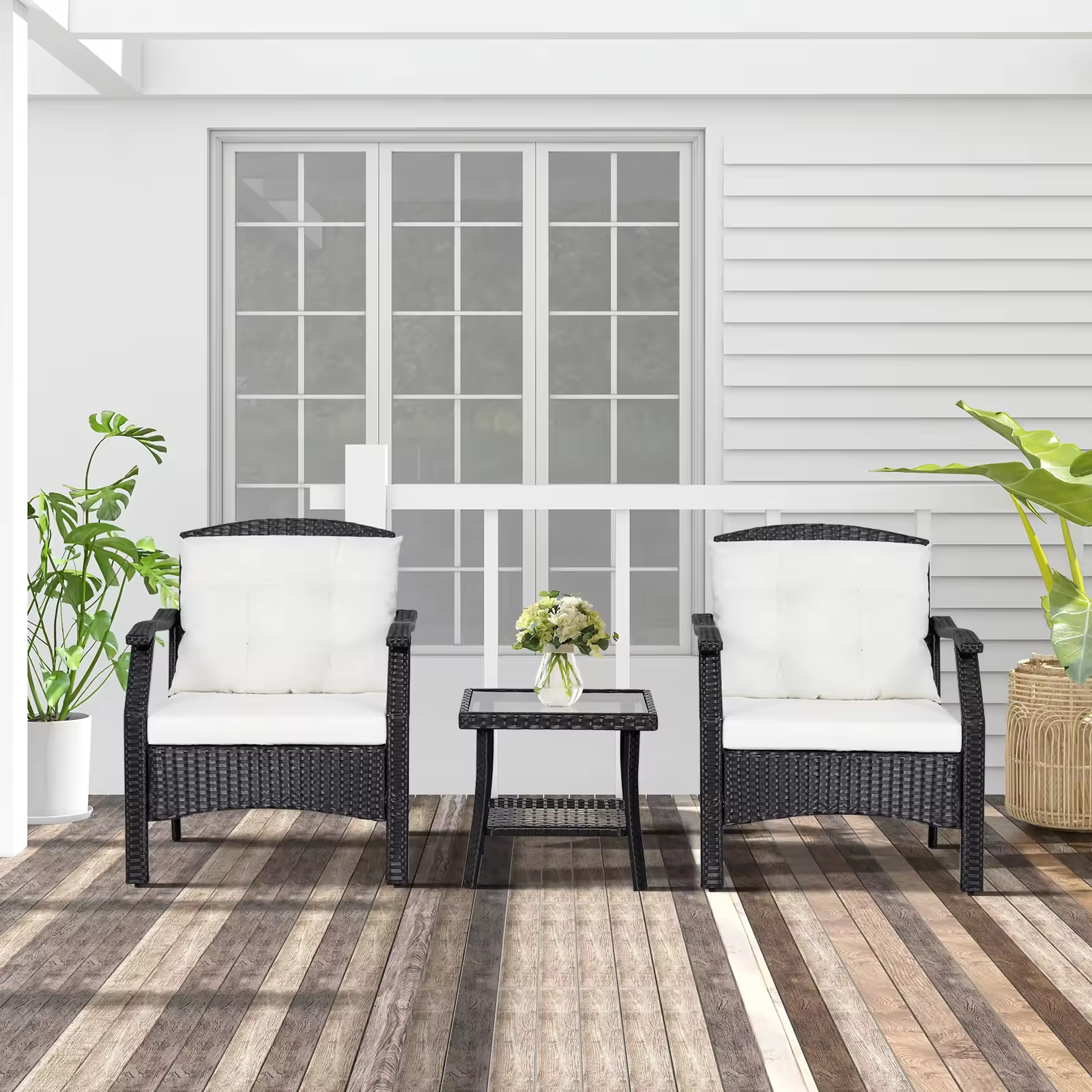 Modern black rattan lounge seating for garden, on a patio