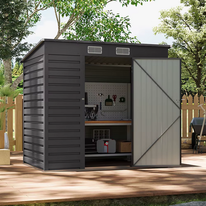 Black garden storage shed with modern finish, on a decking, with tools inside shed