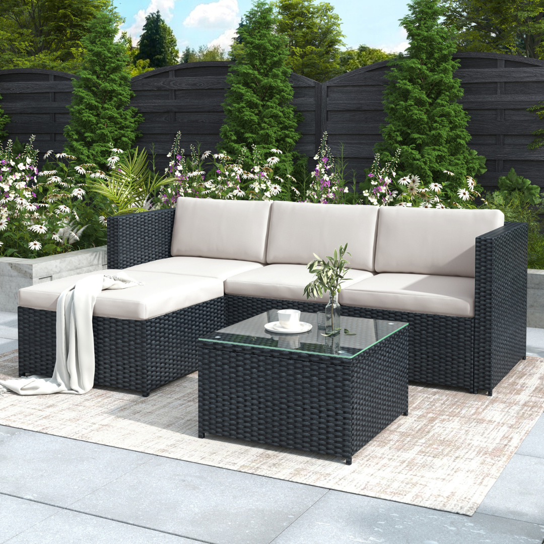 Black rattan corner sofa with cushions for garden or patio