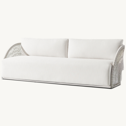 Modern rattan three-seater sofa for outdoor use, cream, angled view