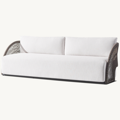 Modern rattan three-seater sofa for outdoor use, dark brown, angled view