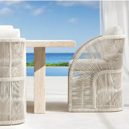 Hand-woven rattan dining chair with Nordic frame, cream, side view