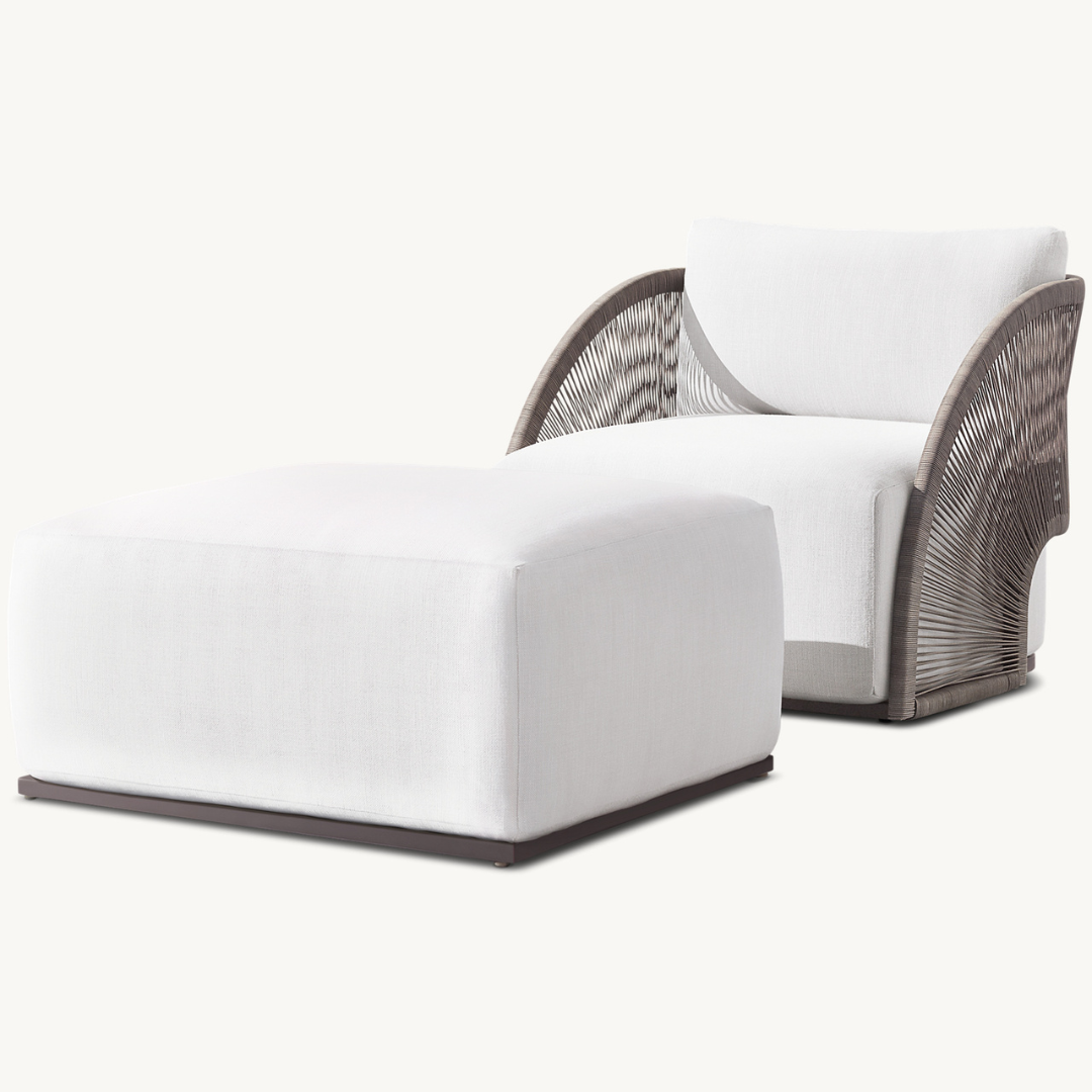 Calidus Nordic Luxury Rattan Pouffe with Calidus Nordic Luxury Rattan lounge chair at a angled view