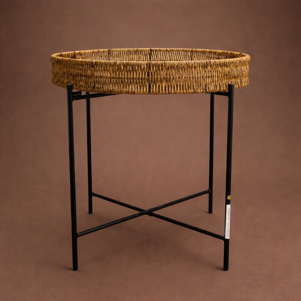 The image shows a wicker side table on a brown studio background.
