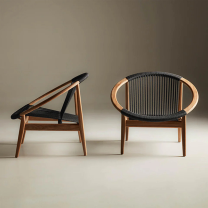 Black Contemporary Teak Garden Lounge Chair in a studio background