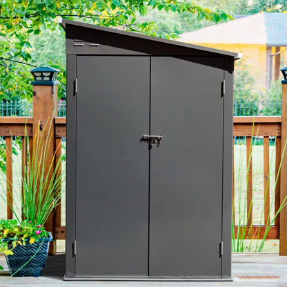 Lean-to black shed positioned against garden wall, image shows the shed free standing