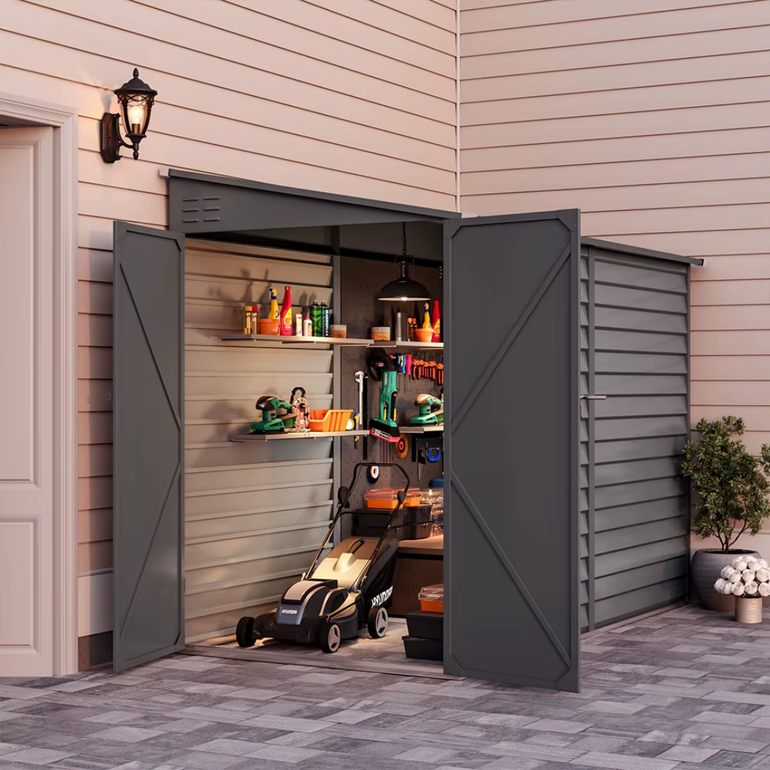 Lean-to black shed positioned against the garden wall; the image shows the shed open, highlighting a lawn mower and tools.