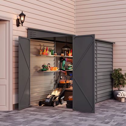 Lean-to black shed positioned against the garden wall; the image shows the shed open, highlighting a lawn mower and tools.
