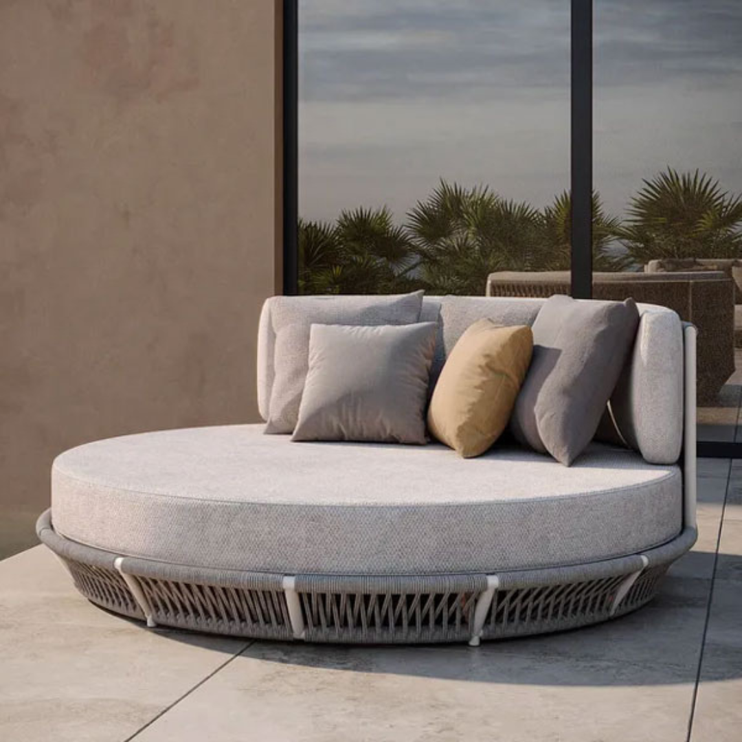 Luxury Braid & Rope Outdoor Daybed with deep cushions, in an outdoor background