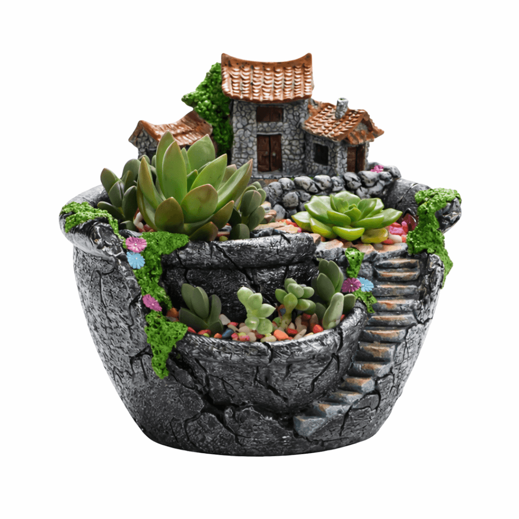 Decorative pot with miniature house and succulents on a white background
