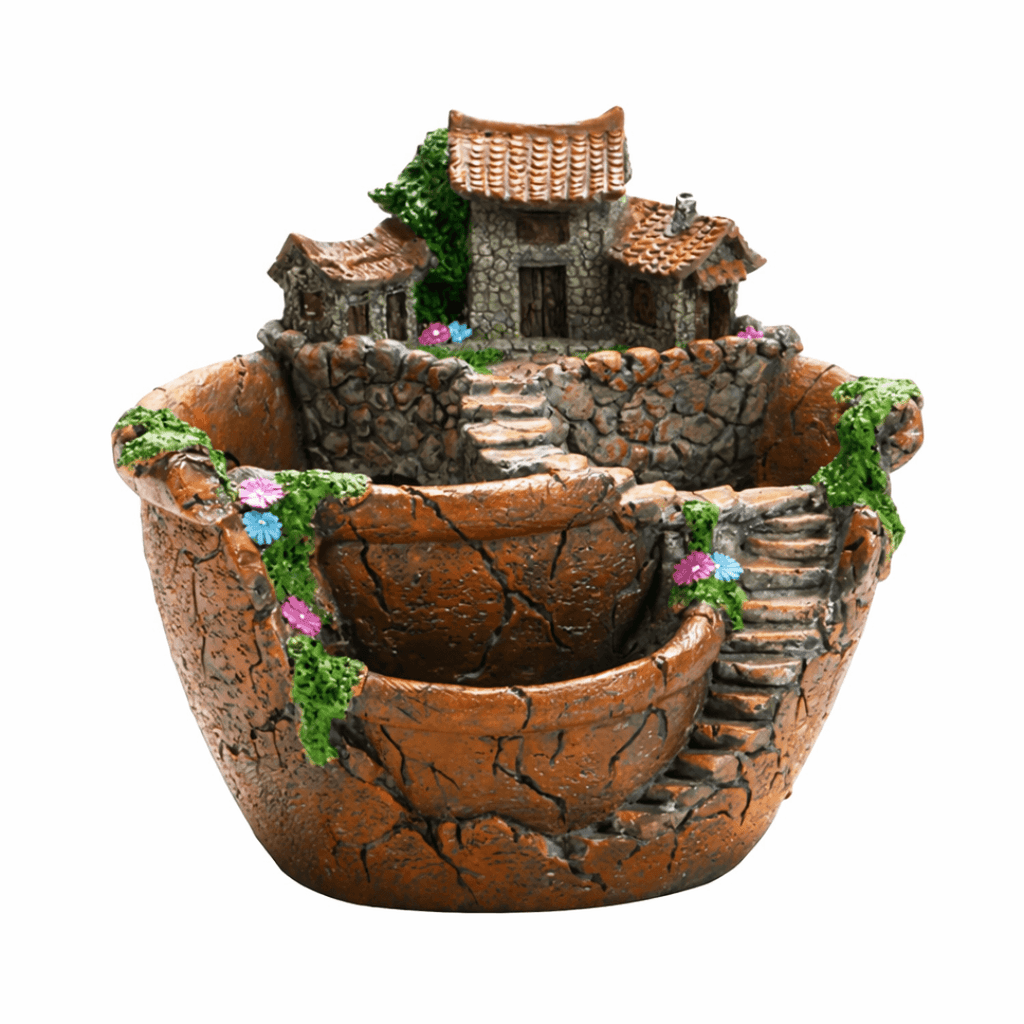 Decorative miniature village inside a pot on a white background