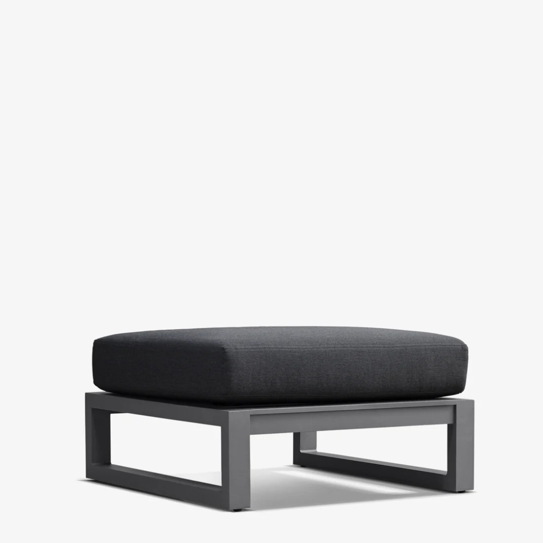 Modern aluminium ottoman, angled view