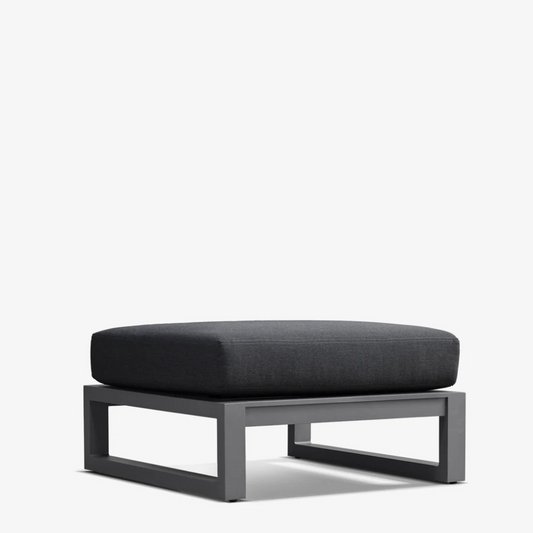 Modern aluminium ottoman, angled view