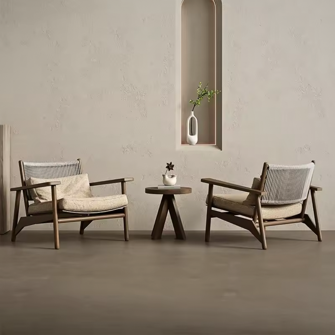 2 Modern luxury outdoor teak armchair with cushion, in a outdoor patio background, with camel cushions.