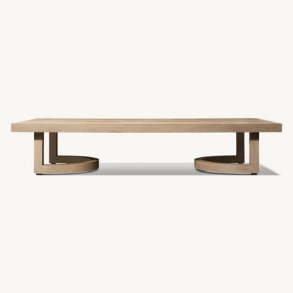 Low outdoor coffee table with natural wood finish, side view, studio background.