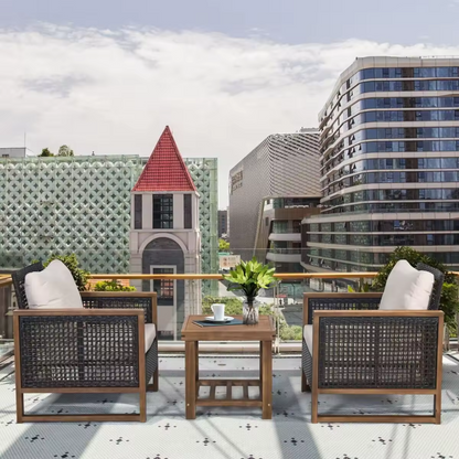 Outdoor accent rattan lounge chairs set with cushions, on a terrace
