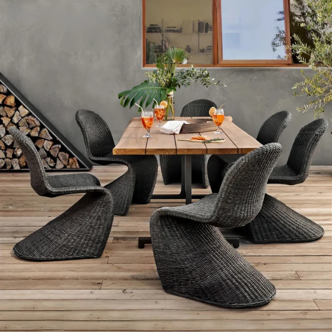 Curved Accent Rattan Outdoor Dining Chairs with stylish design, black chairs in a background