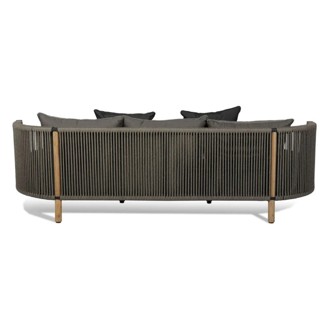 Outdoor rope furniture set with cushioned seating, back of sofa with a white background