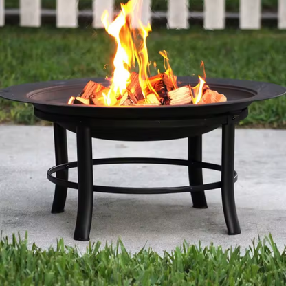Metal fire bowl with clean circular design for garden, in a garden setting