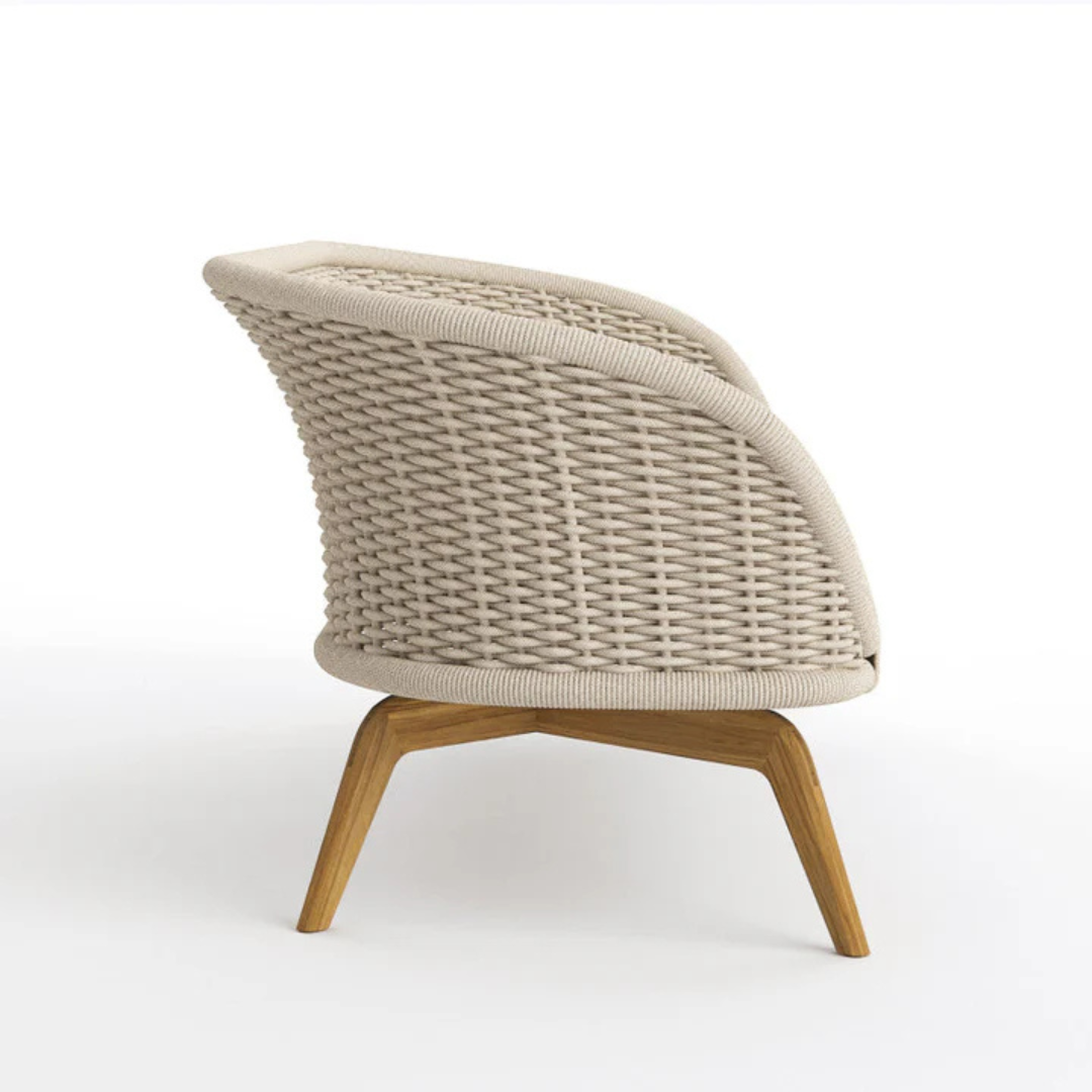 side view of beige lounge chair