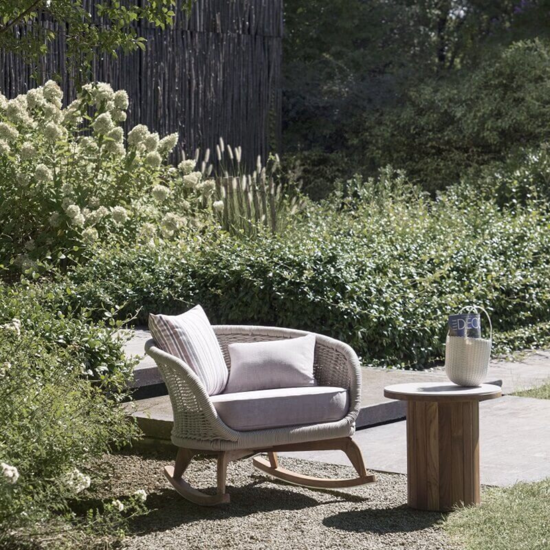 Rocking chair in a wilderness garden