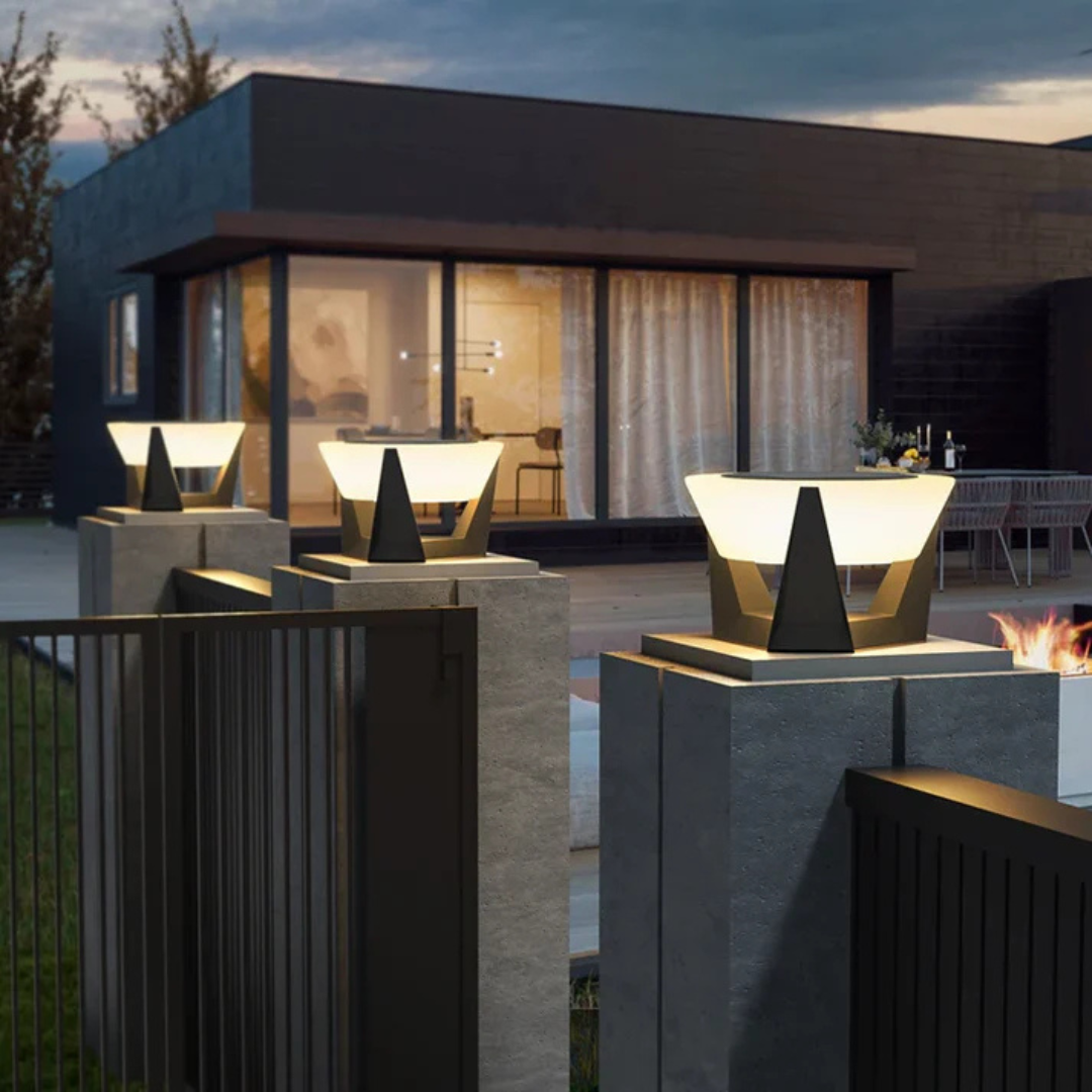 Round LED solar lamps for outdoor garden lighting, on pillars